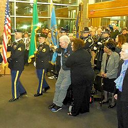 Society Director Emeritus (and first mayor of the City of Lakewood) Bill Harrison is among those standing for the entrance of the color guard.